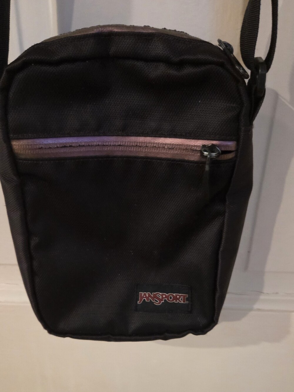 Jansport Black Messenger Sling Bag with Purple Zipper Accent